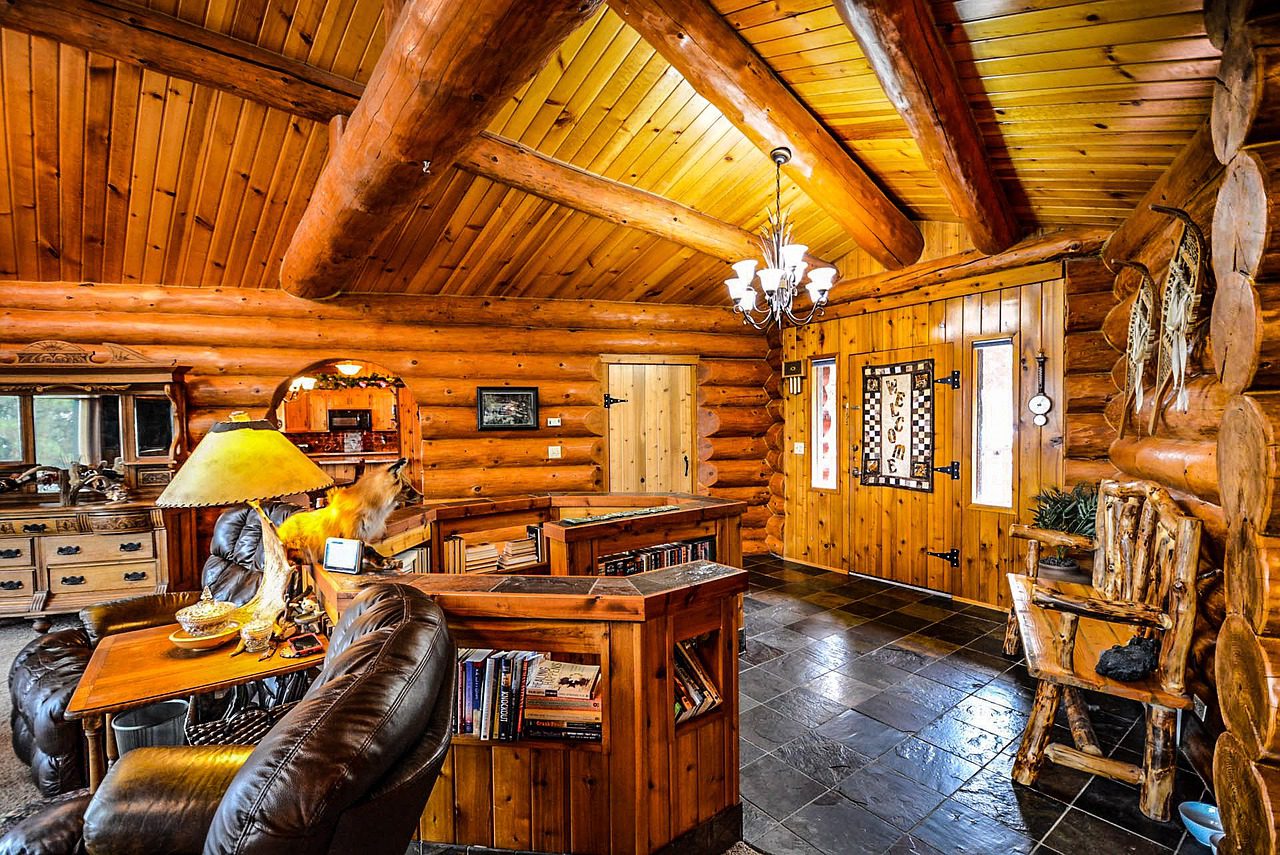 the inside of a custom built log cabin in the blue ridge mountains