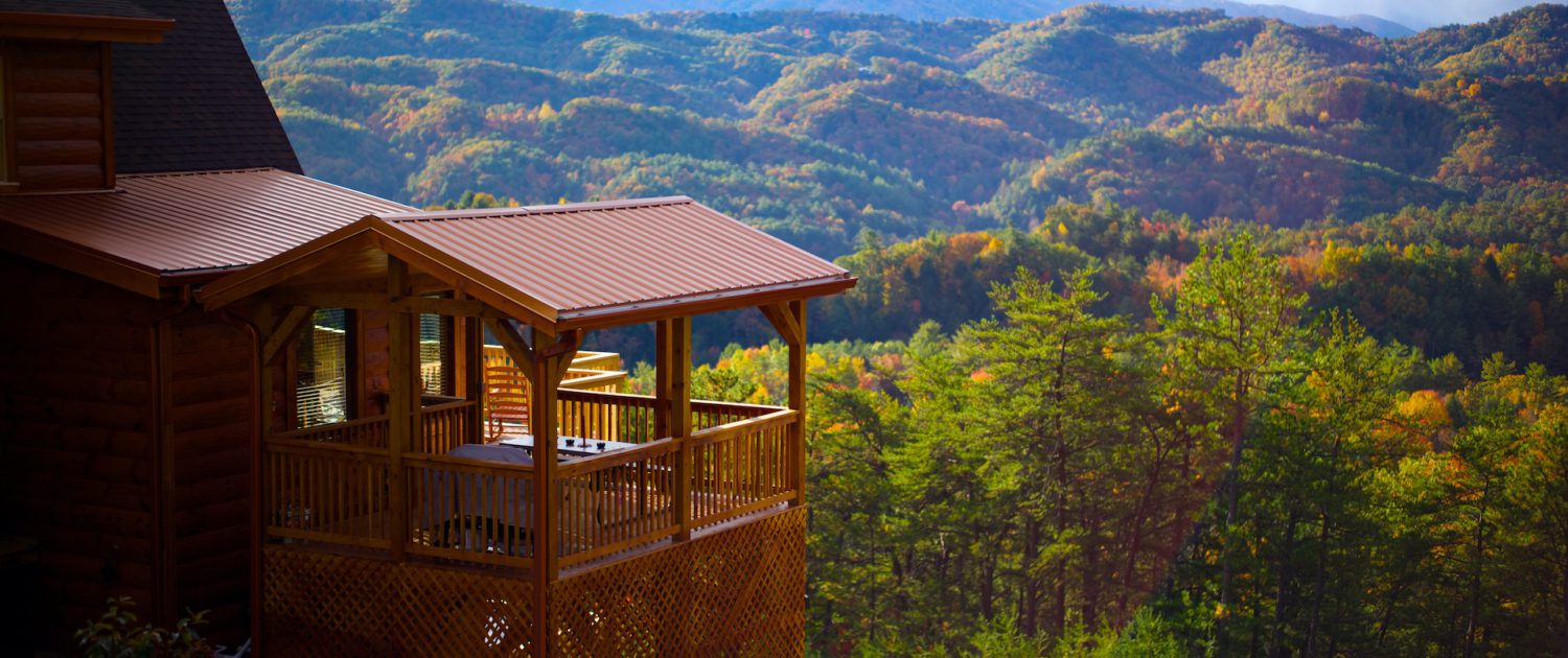 a log cabin with a great view facing the blue ridge mountains